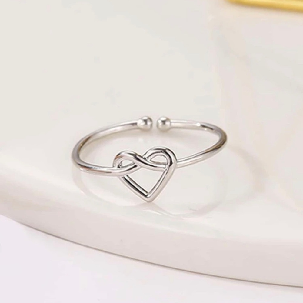 Knotted heart ring